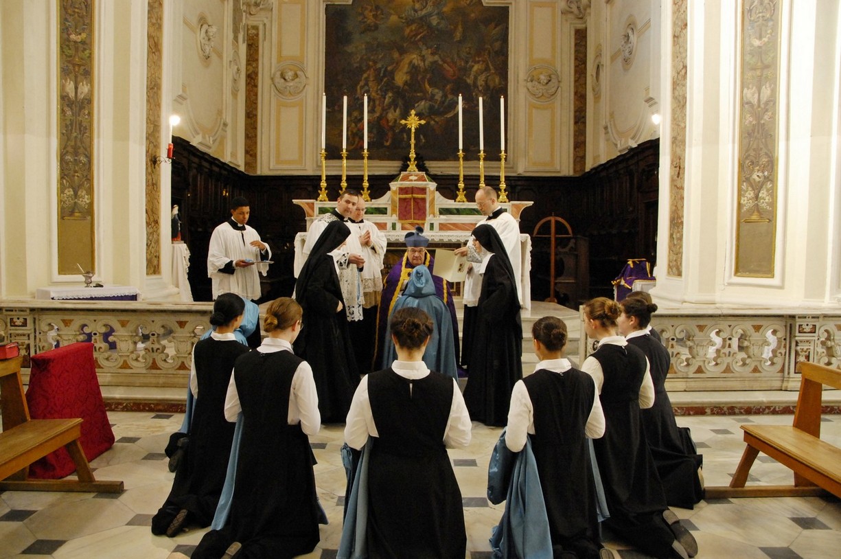 Nine new postulantes receive the cross